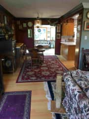 Looking from the front door through the living and dining rooms toward the sunroom.