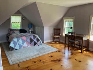 upstairs guest room with queen bed