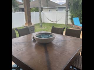 8-person outside dining area with fire pit table!