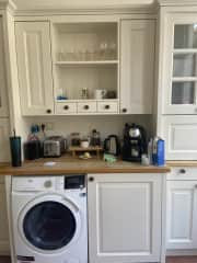 Kitchen with washer/dryer + espresso machine