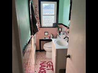 Bathroom with tub and shower.