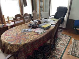 Dining room table to use as a workstation.  Plug your computer into the strip near the windows and use our 1 gig home internet.