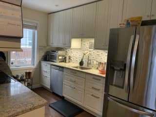 Kitchen, large island not in picture. New appliances, well stocked kitchen.