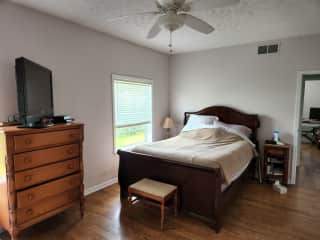 Master bedroom with TV and VCR.