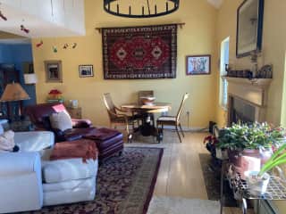 Living and dining area with gas fireplace.