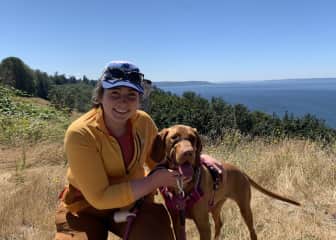 Taking Ruby the Vizsla puppy out for a hike on the bluffs overlooking Puget Sound. We pride ourselves on planning all sorts of enriching outdoor adventures for the dogs we sit.
