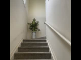 foyer leads from front door up stairs to main level