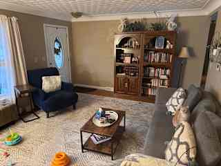 Sissy giving a living room tour