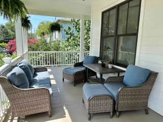 Enjoy a cup of coffee and a book on the spacious front porch.