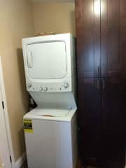 We have a stackable washer and dryer that can handle big loads of laundry.