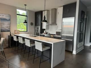 Kitchen with a Gaggenau steam oven and oven, thermador cooktop , breville microwave, Bosche fridge/freezer & dishwasher & large sink