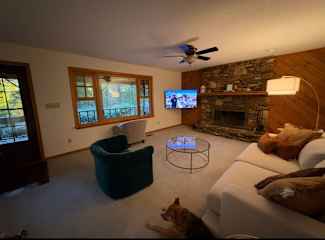 Living room with screened door.