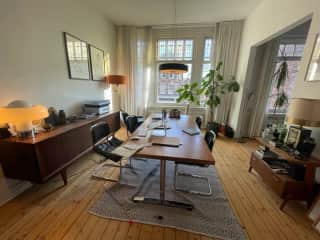 Living area with dining table and work space