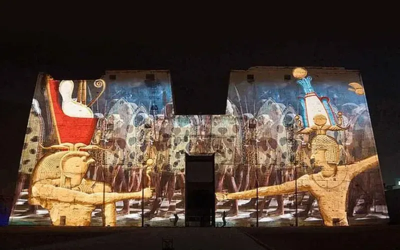 Philae Temple Sound and Light Show Aswan — illuminated pylon at night, Isis temple