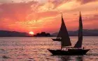 Sunset over the First Cataract Aswan — return felucca journey from Soheil Island