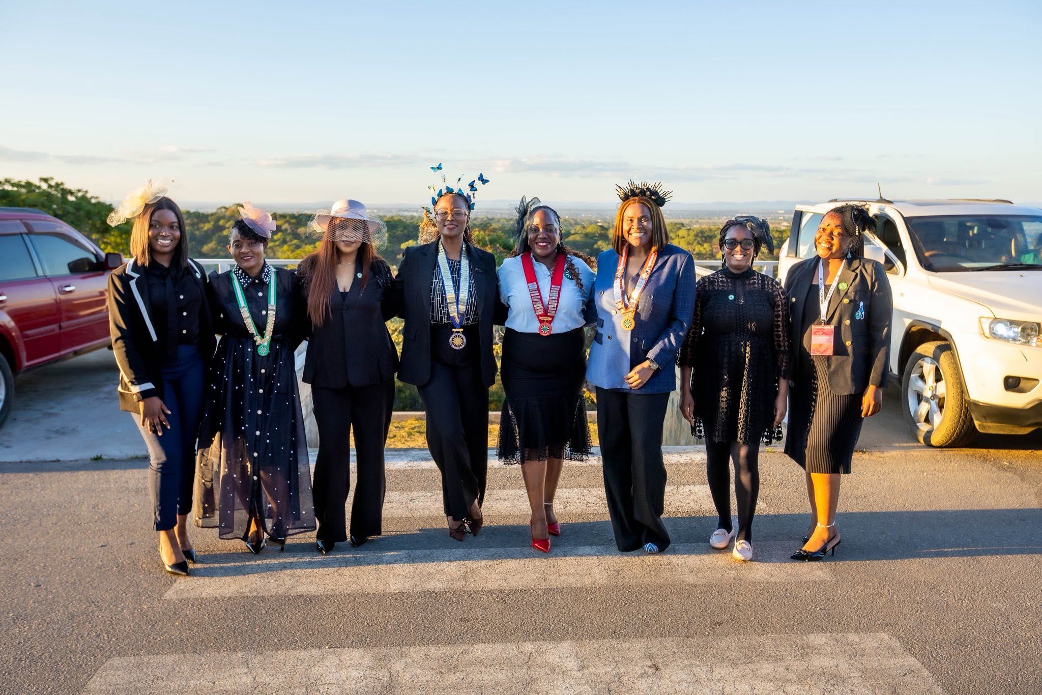Ladies’ Circle members gathered outdoors after a formal event