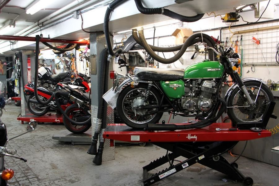 Motorcycles on lifts in the Cycle Therapy NYC service bay