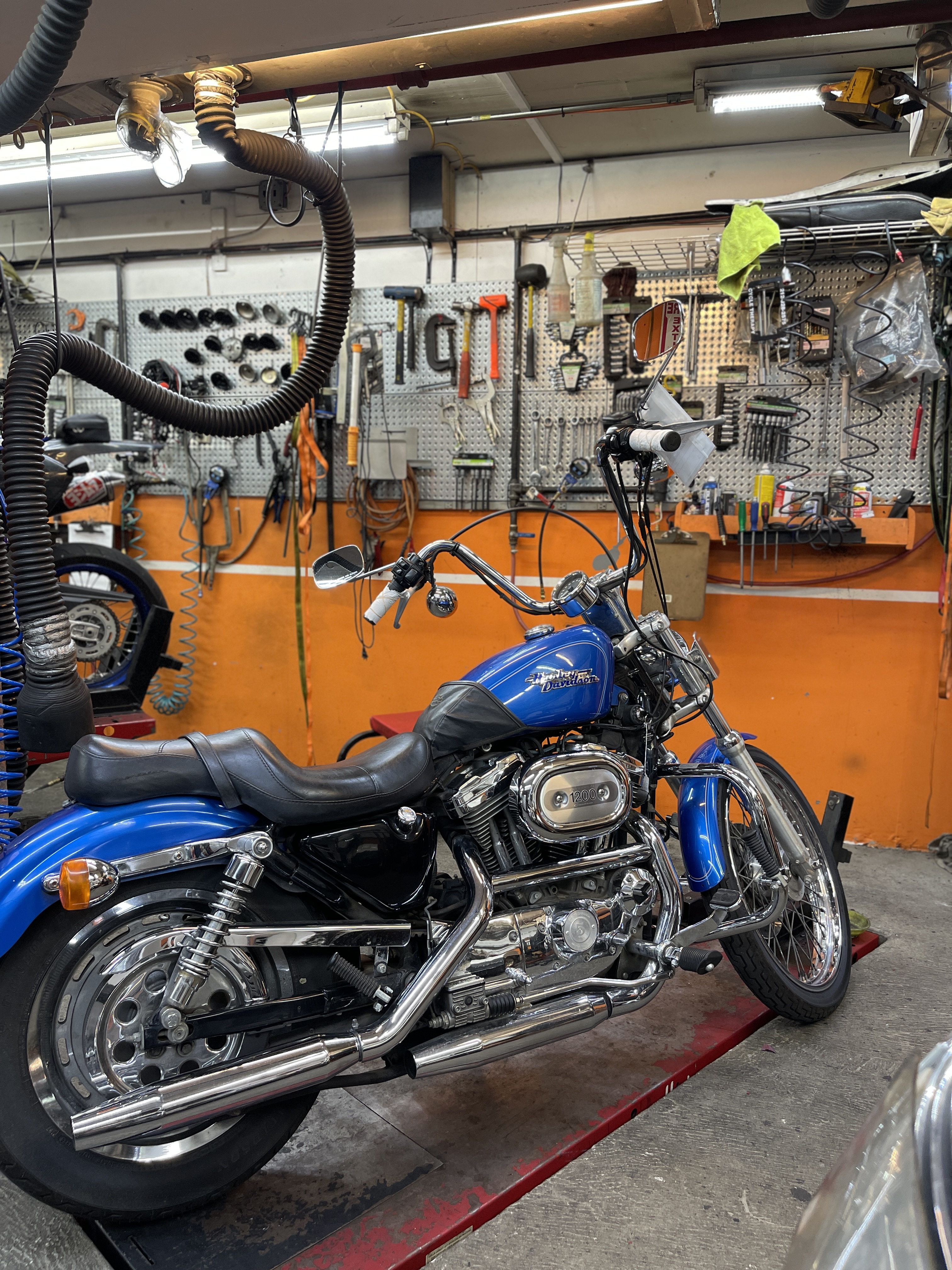 Cycle Therapy NYC mechanic performing inspection work