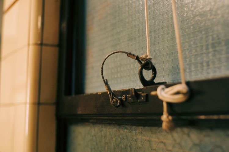 Close up shot of a window latch inside The Nicholas Building
