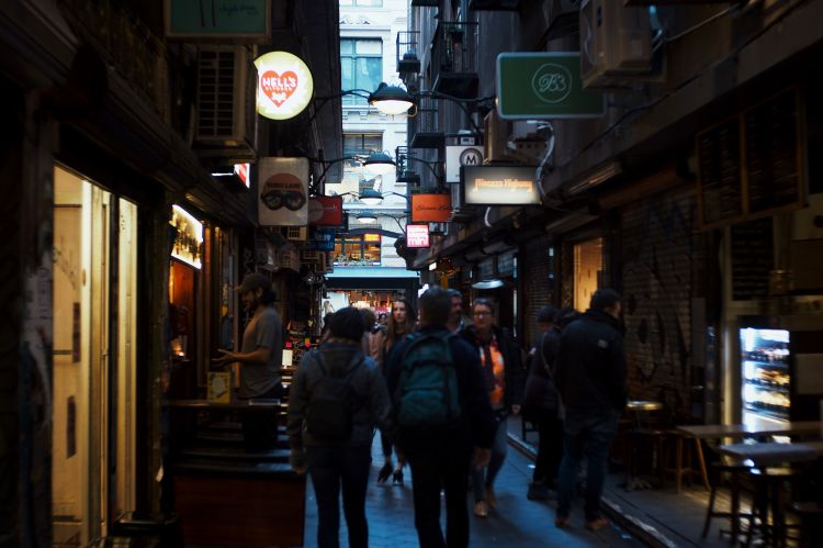 People walking through Centreway Arcade