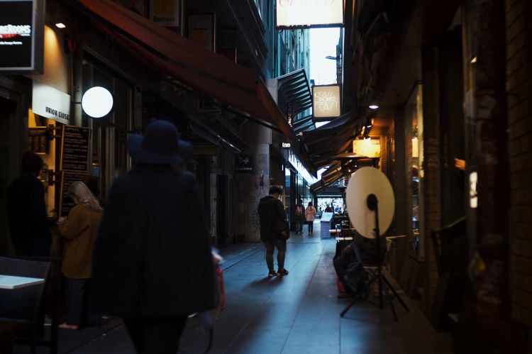 People walking through Centreway Arcade