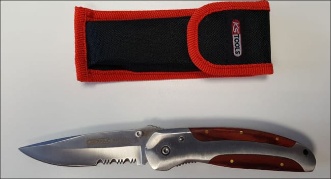 Foldekniv med låsmekanisme, belteholder