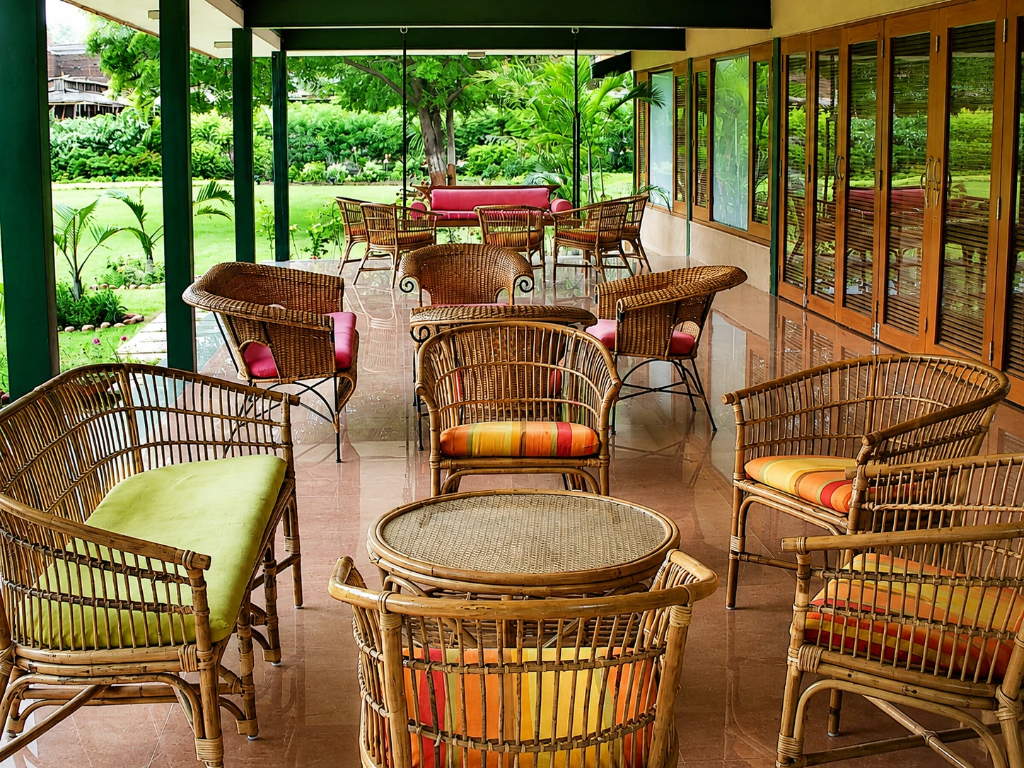 Wicker Patio Lounge Overlooking a Lush Garden