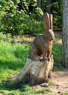 One of several wooden statues