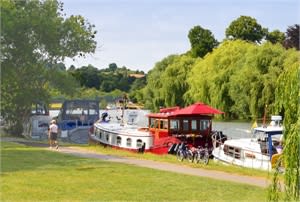 Explore quaint shops, take a brisk walk up Winter Hill to enjoy the views or relax by the riverside.