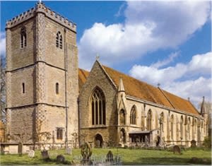A historic village in Oxfordshire with many thatched cottages.