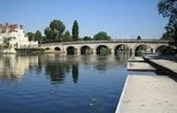 Located on the Thames, the town has a long history and is popular with shoppers.