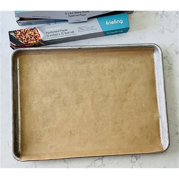 Baking sheet with parchment paper shop