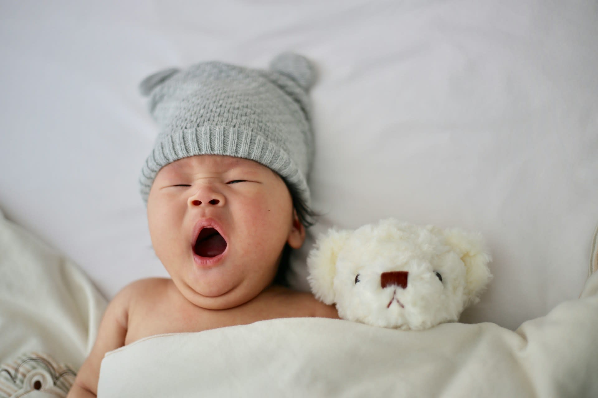 Baby sleeping with toy