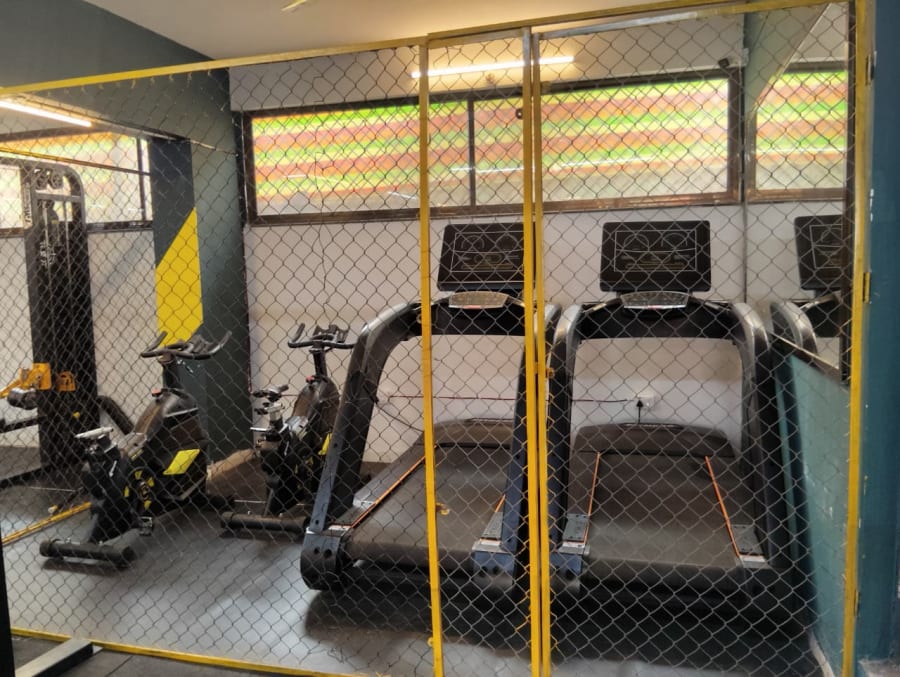 Treadmills and exercise bikes in the cardio zone