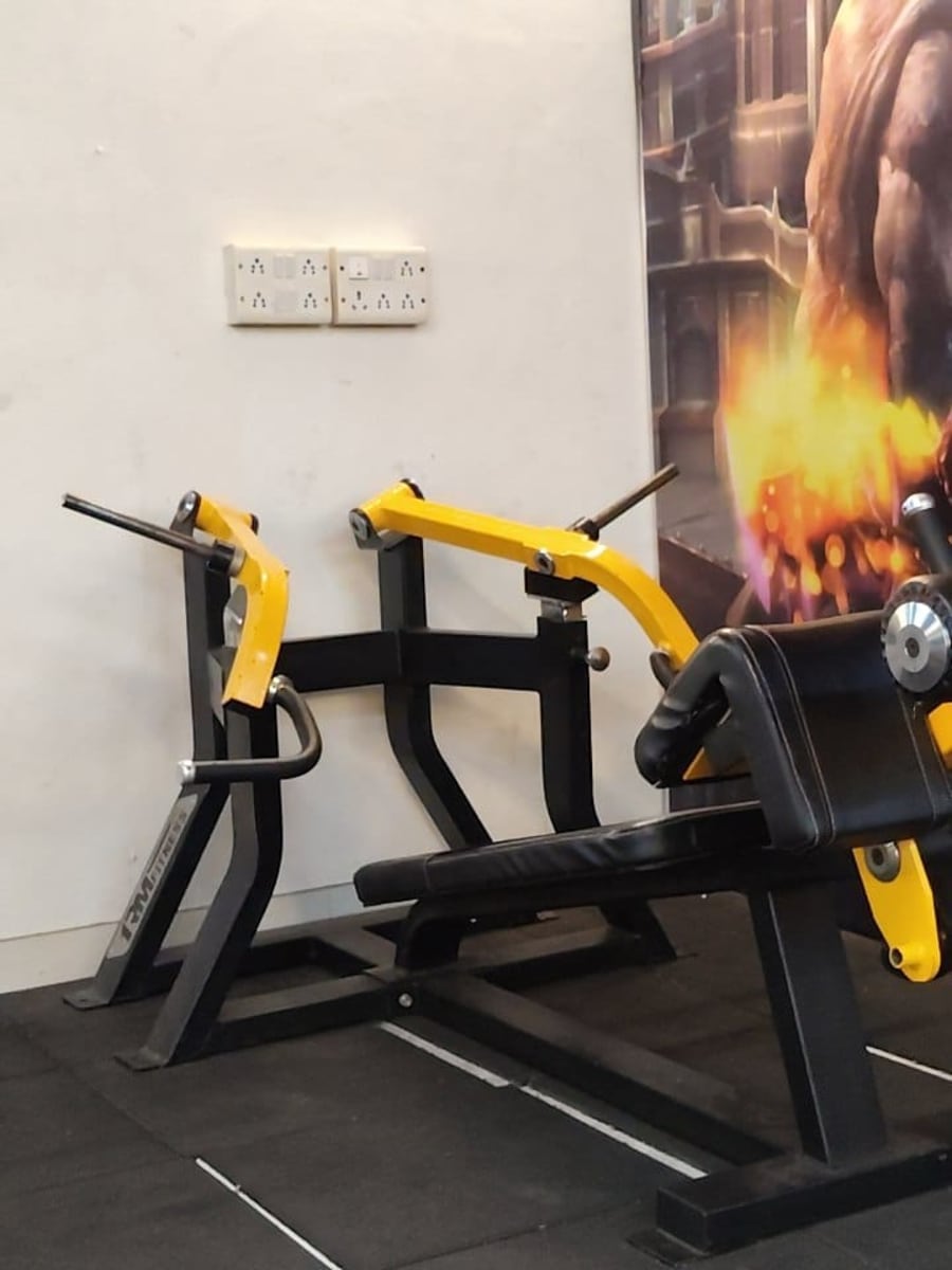 Plate-loaded strength equipment at Shree Health Club