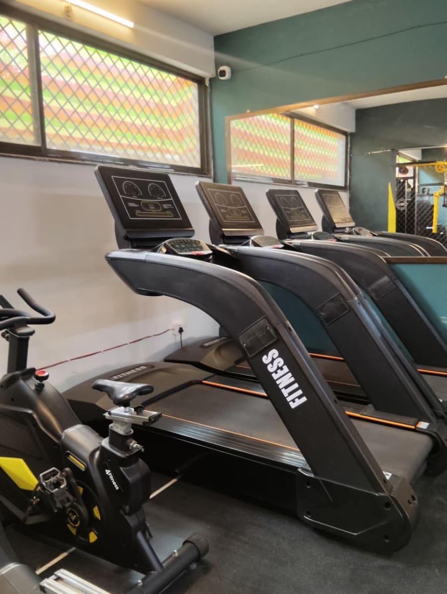 Treadmills and exercise bikes ready for cardio training