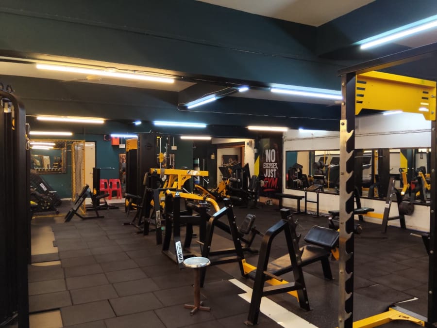 Strength equipment arranged across the main gym floor