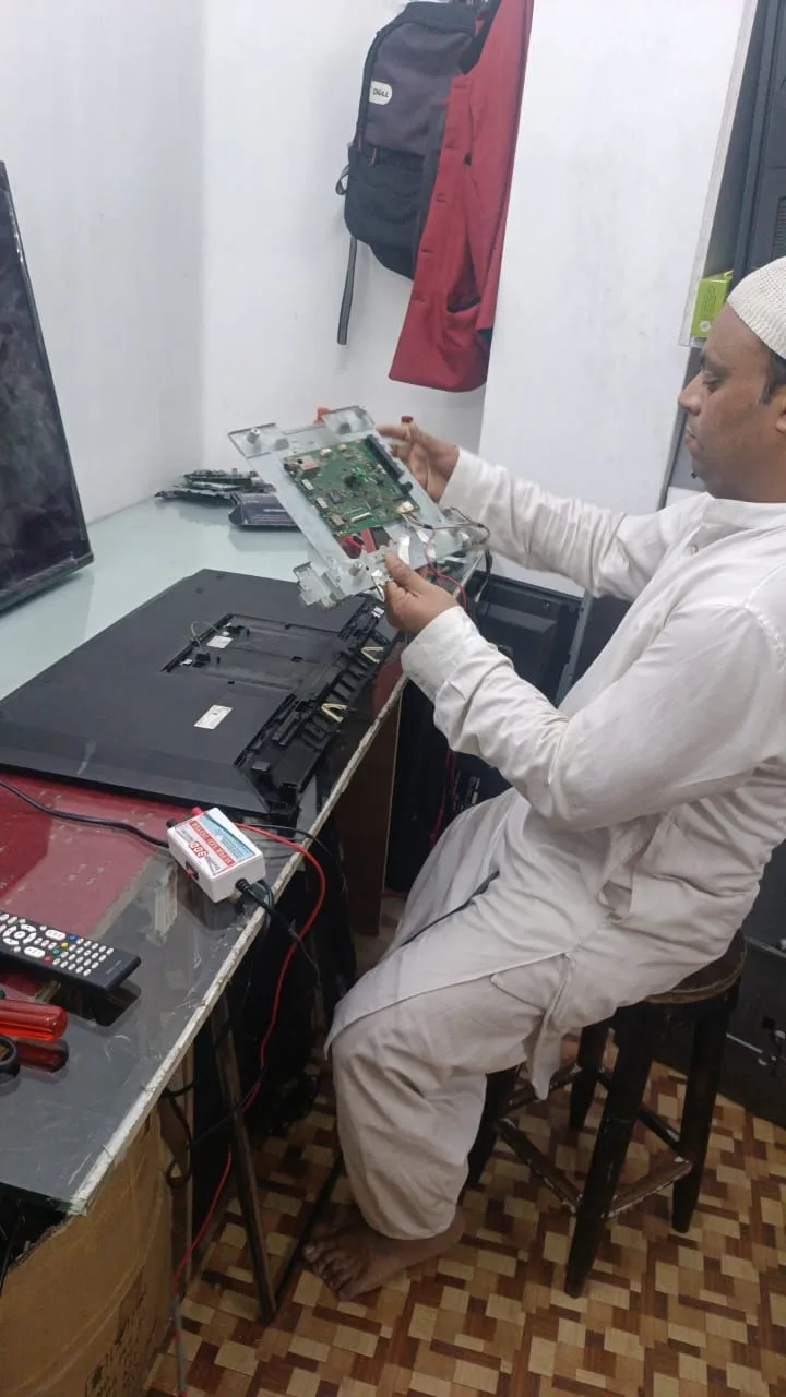 Technician repairing water purifier filters at customer home