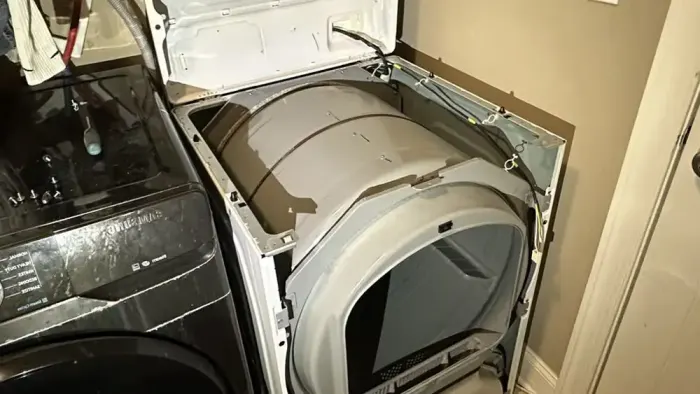 RepairKE technician repairing a household appliance on-site in Nairobi