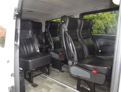 Leather seats inside the van for groups of up to 8