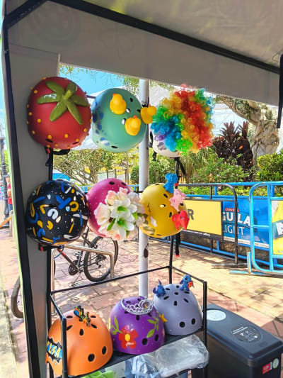 Fun helmets for the scooter tour: strawberry, ducks, flowers