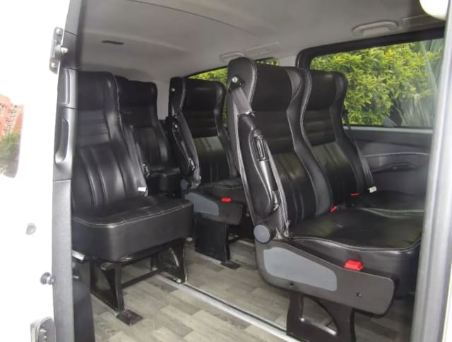 Leather seats inside the van for groups of up to 8