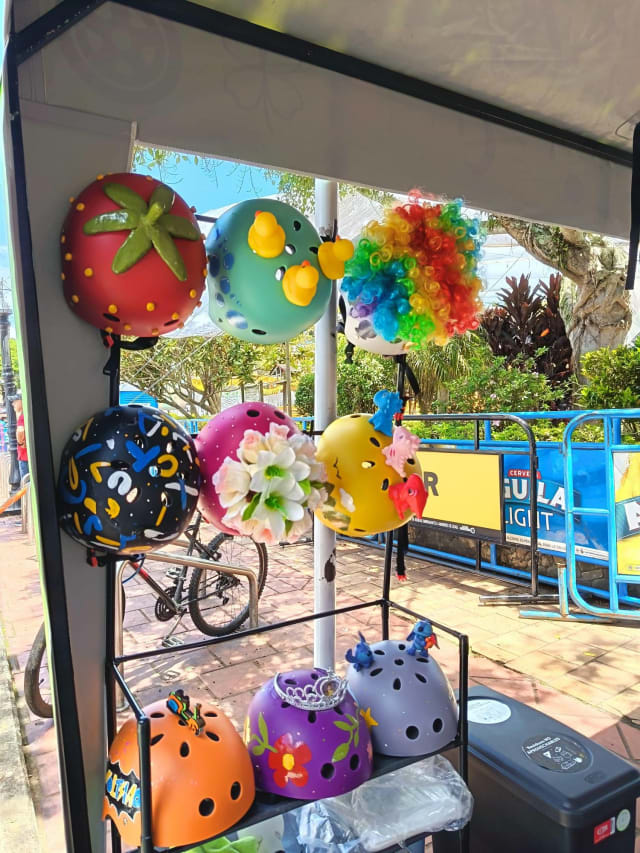 Fun helmets for the scooter tour: strawberry, ducks, flowers