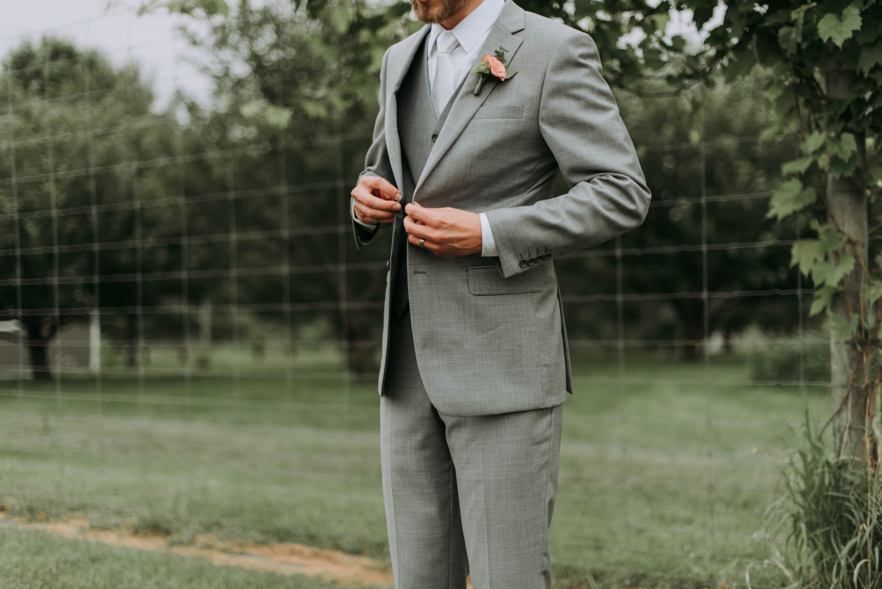 A smart pre-worn groom's suit