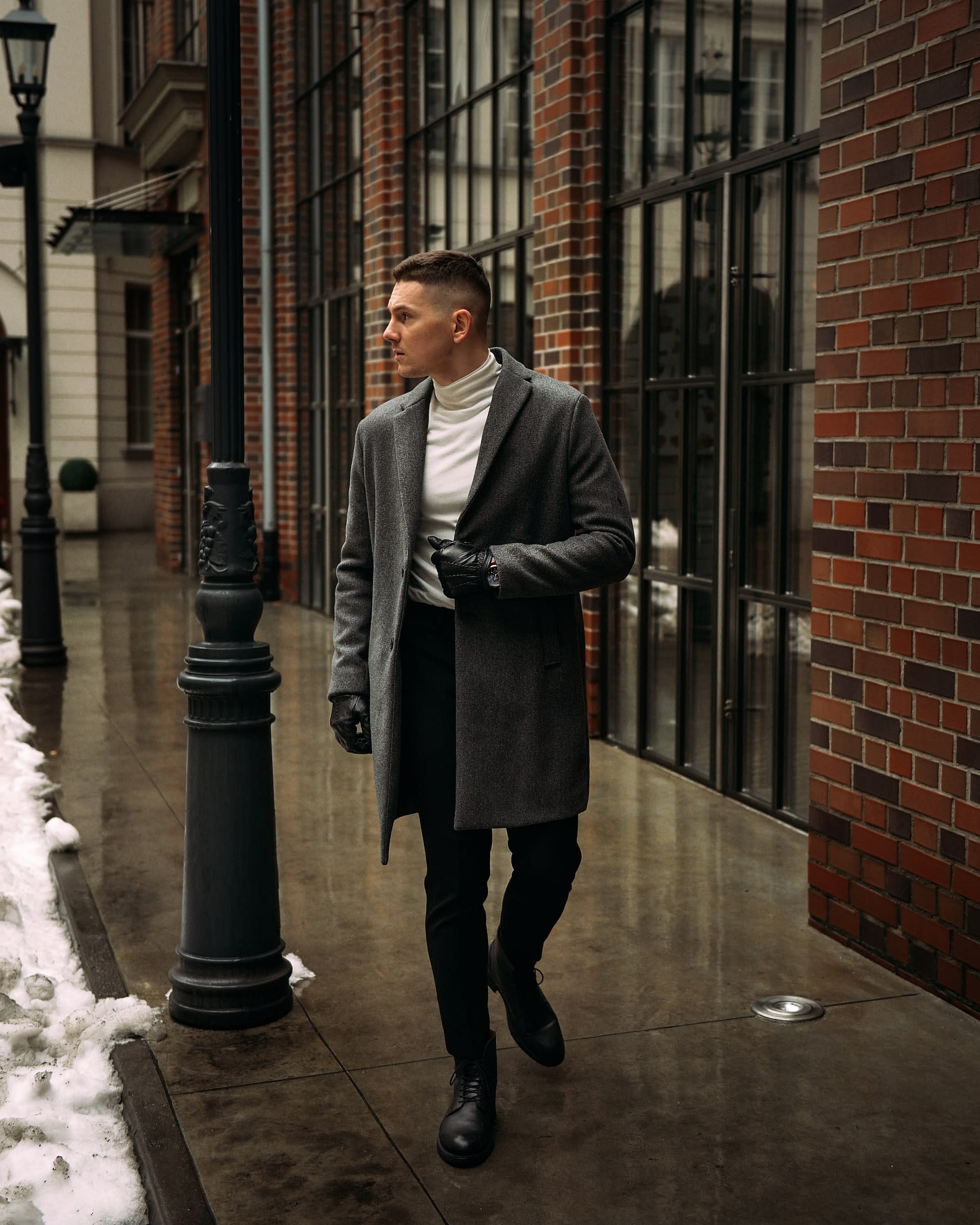 Man walking down the street in a grey pea coat