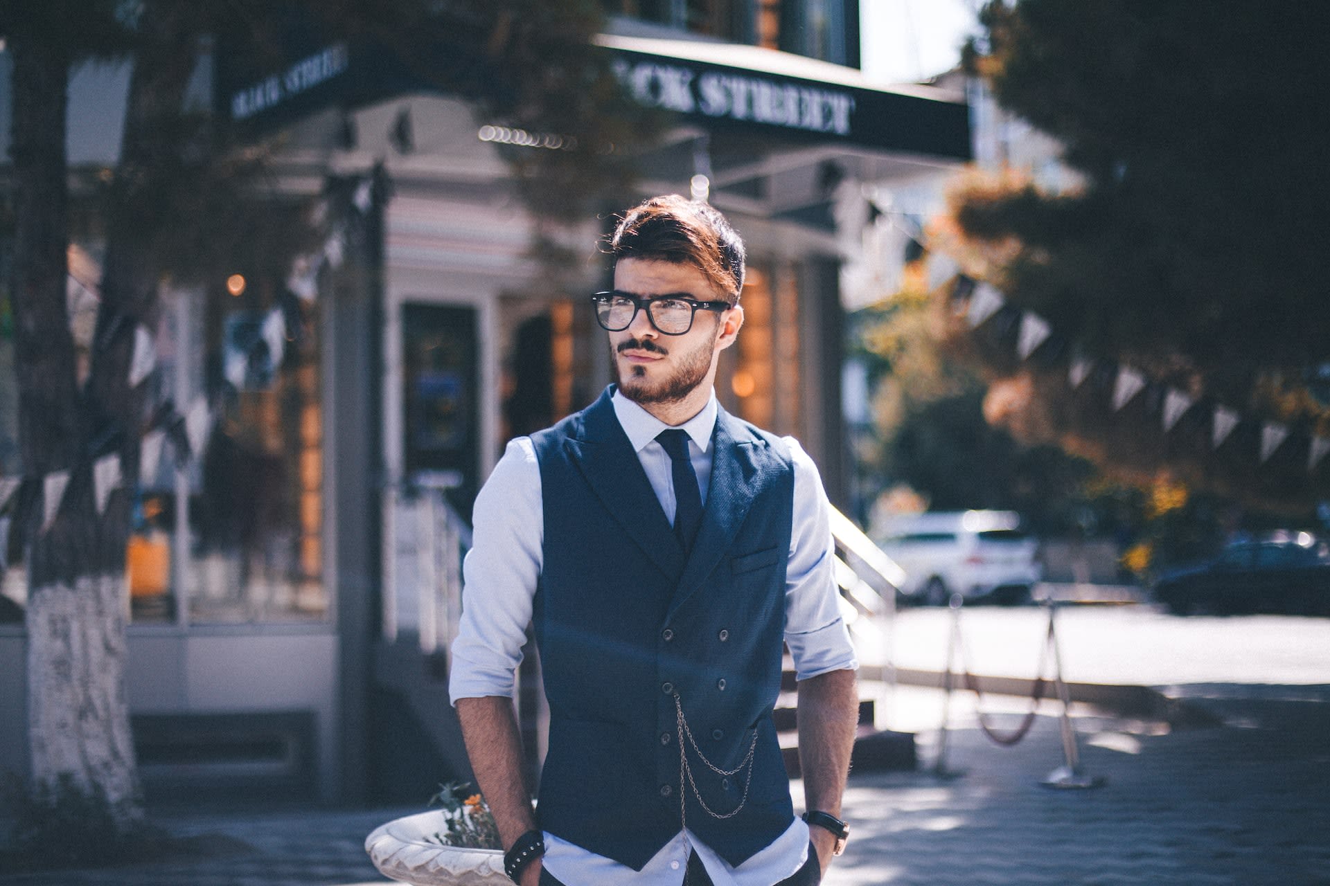 Man wearing a waistcoat with chain detail