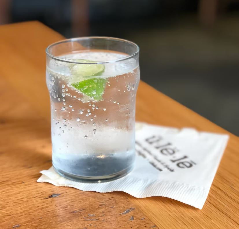 Cold fizzy water in glass