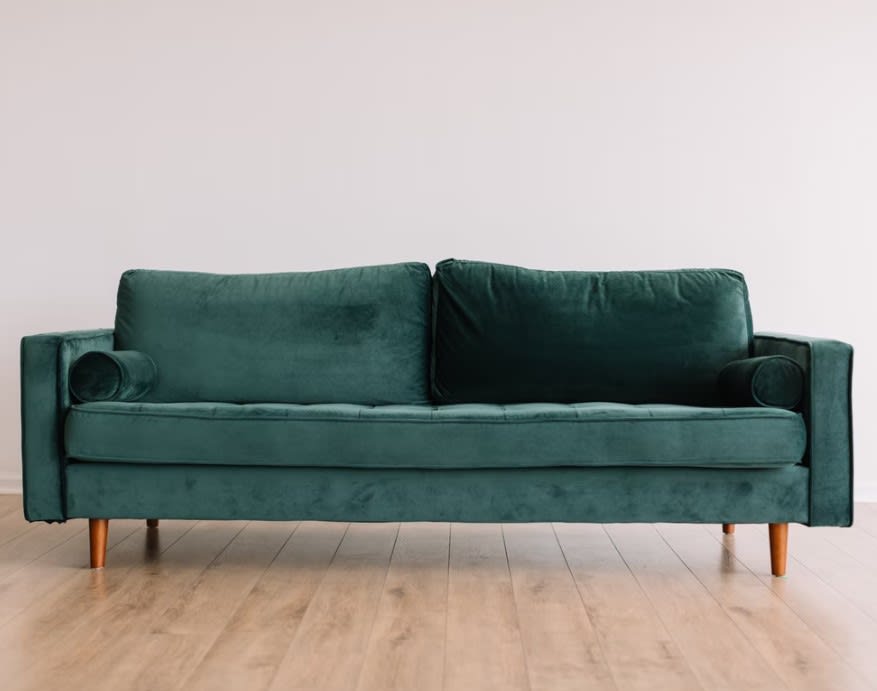 Modern green second-hand sofa
