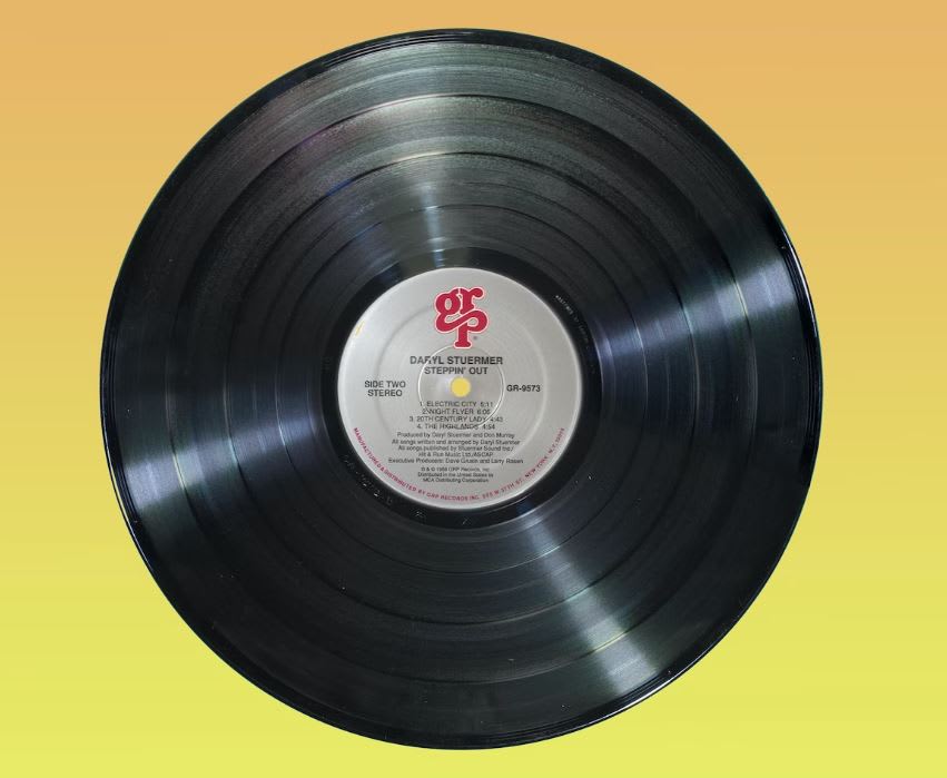 Vinyl record with yellow background