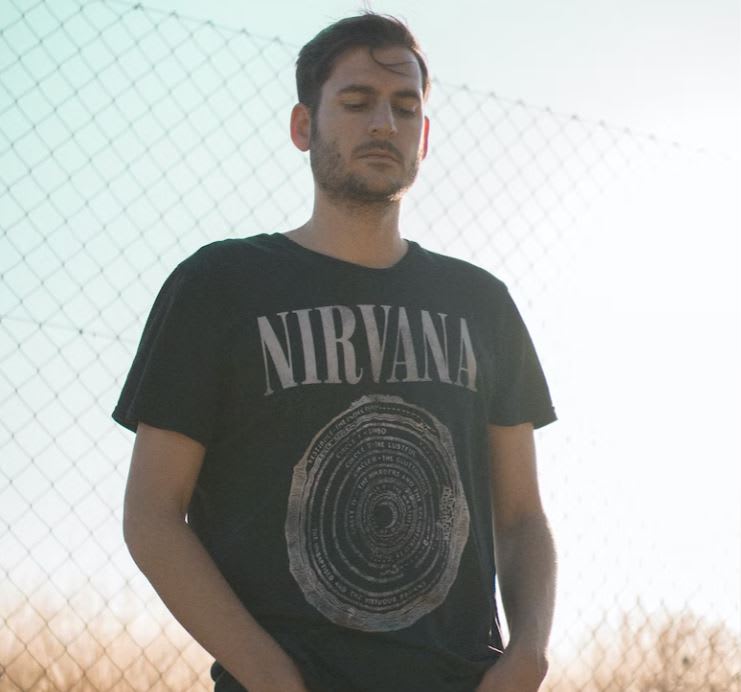 Man wearing vintage Nirvana t-shirt tee